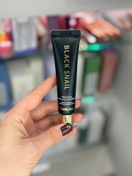 Антивікова сироватка-роллер для шкіри навколо очей FarmStay Black Snail Premium Rolling Eye Serum з муцином равлика 001245 фото